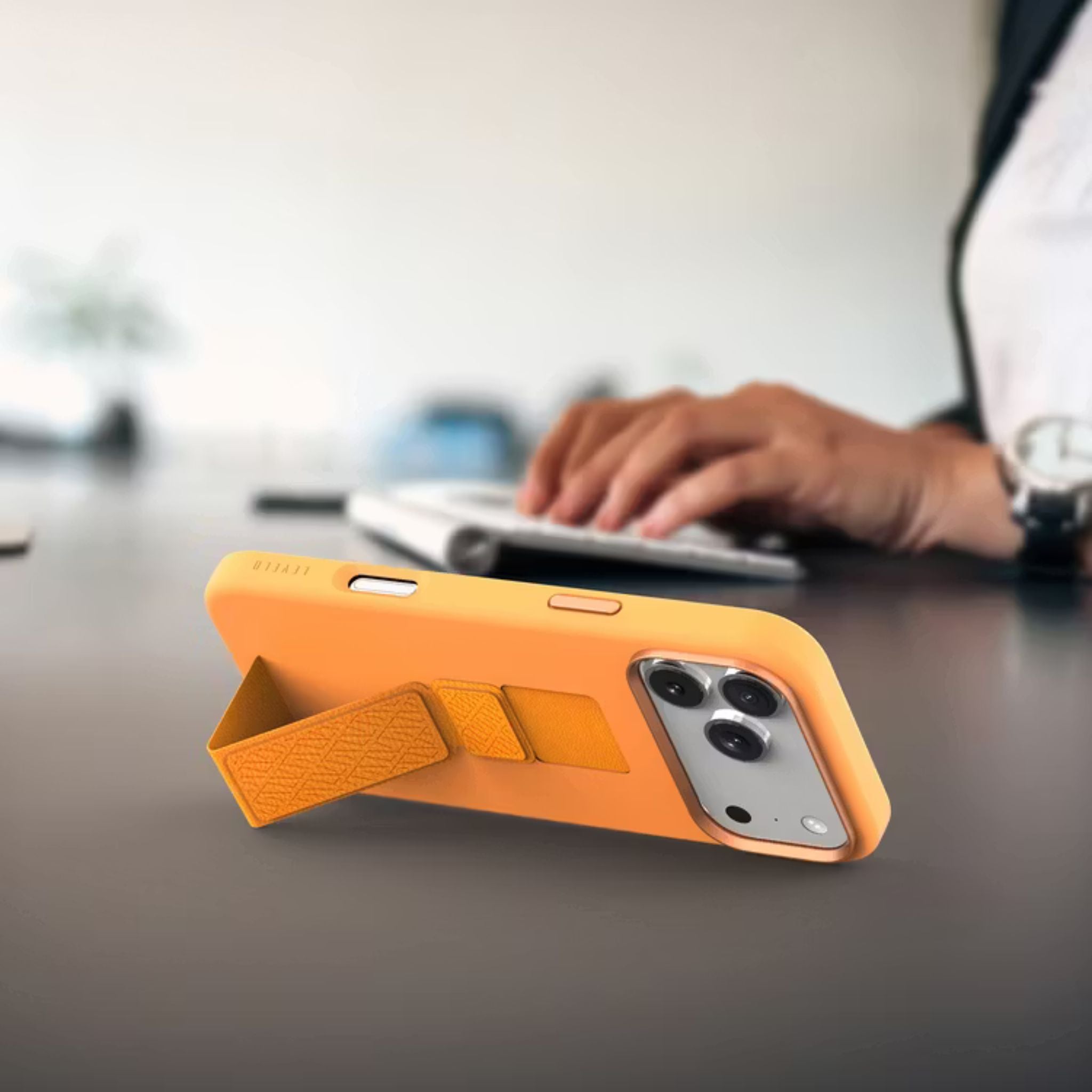 Levelo Morphix Silicone GripStand Case for iPhone 17 Pro, Hands-Free Viewing, True Microfiber Interior Lining, Horizontal & Vertical Stand, Shock-Resistant Bumper, Raised Bezels for Camera & Screen, Slim Fit Design - Orange
